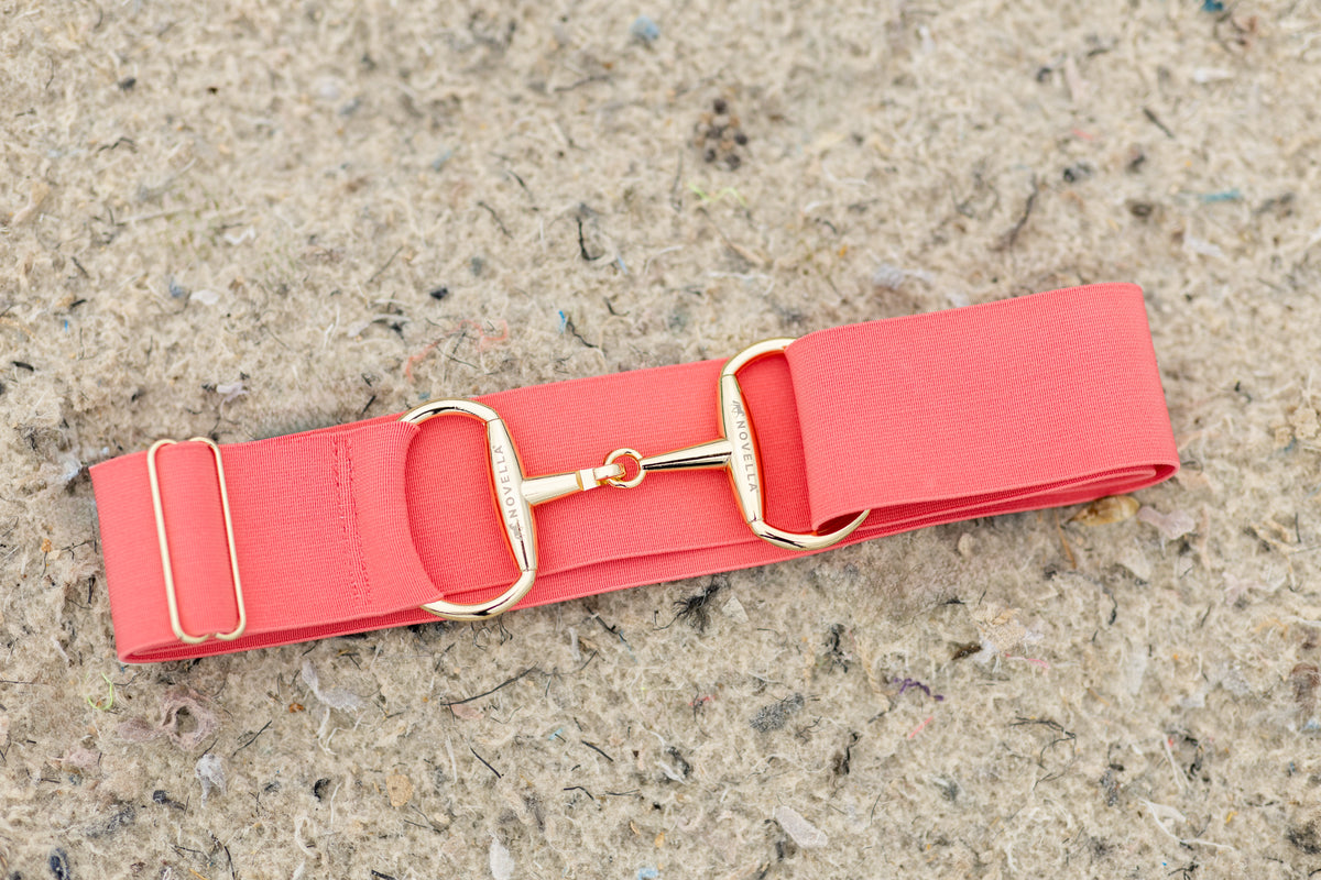 The Novella Snaffle Belt in Coral.
